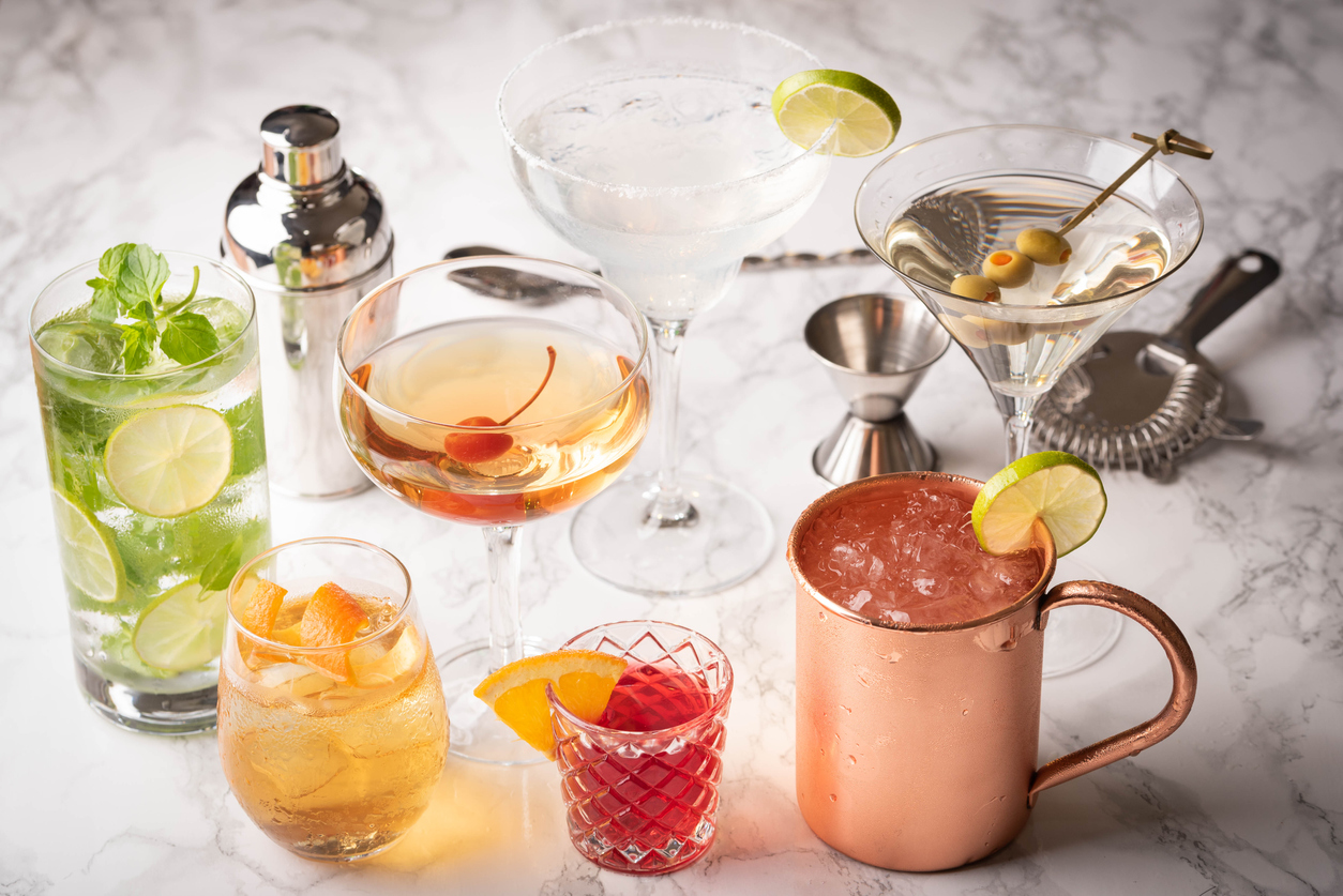 collection of classic cocktails, mojito, moscow mule,  negroni, old fashioned, manhattan, margarita, martini